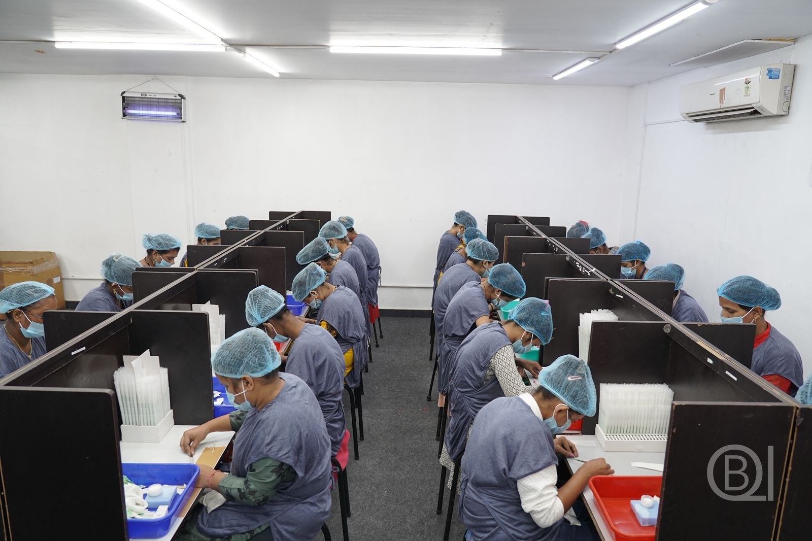 Pre-rolled cone production floor workstations at QBI factory, New Delhi
